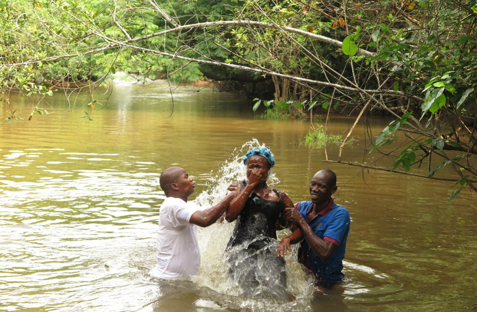 Courage in the Battle for Nigeria Baptism in river. President's Letter