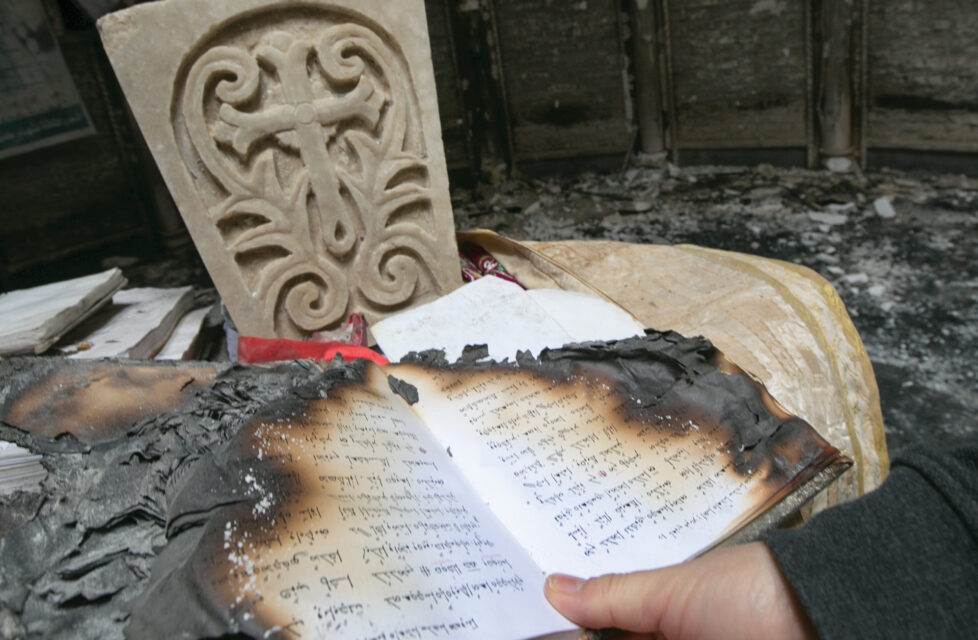 Qaraqosh Man Captured By ISIS for Christian Heritage A burned bible