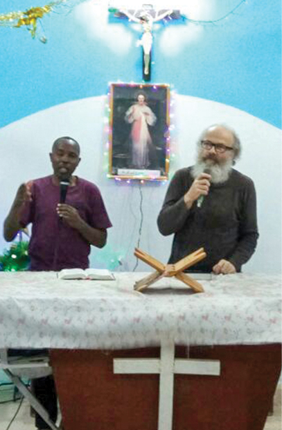 two men leading a church service