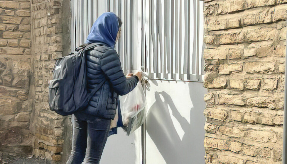 a woman in Iran distributes Bibles