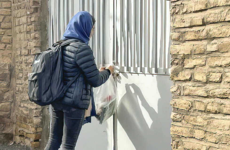 a woman in Iran distributes Bibles